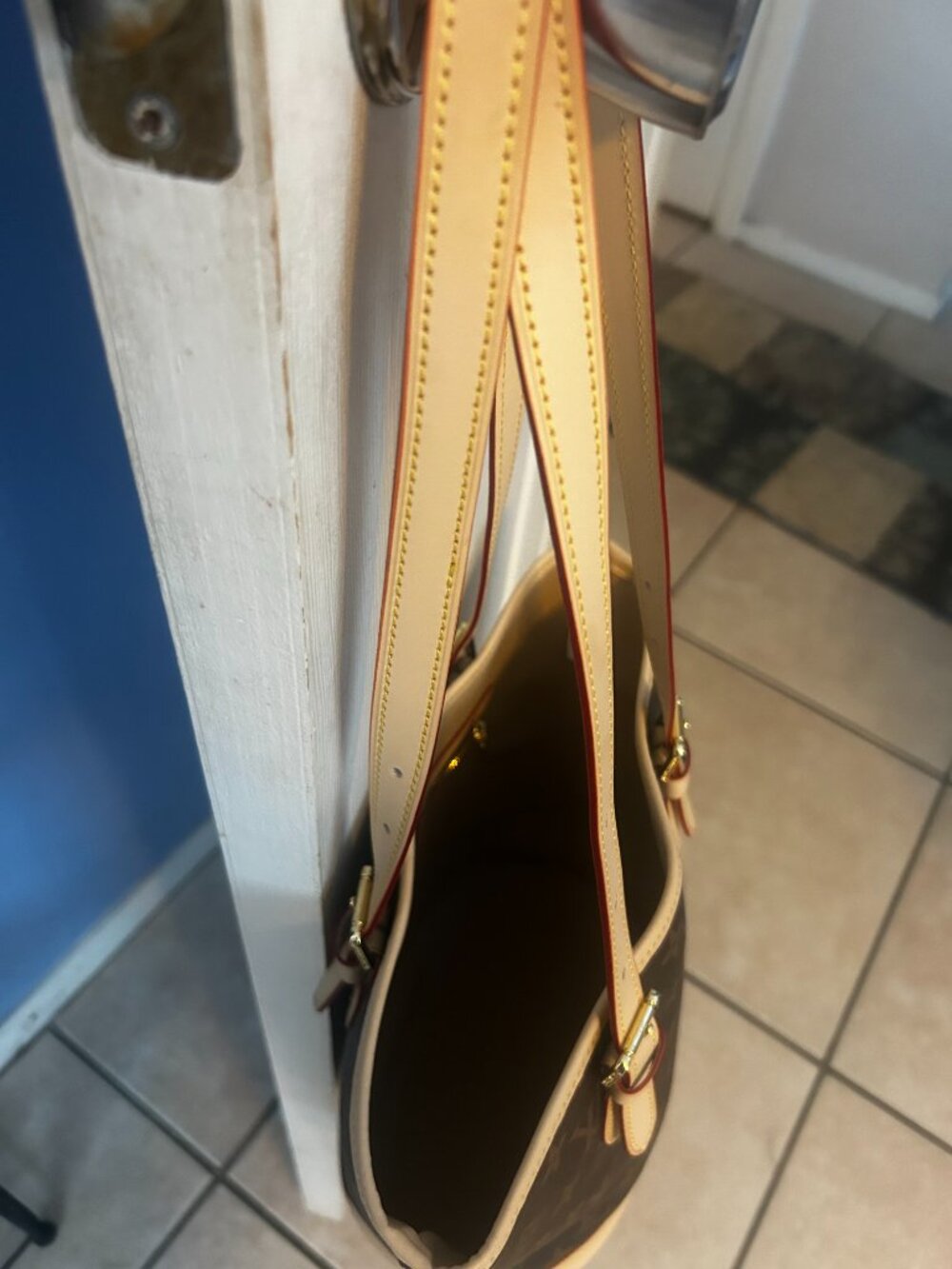 Brown Monogram bucket bag with monogram canvas. - Picture 4 of 7